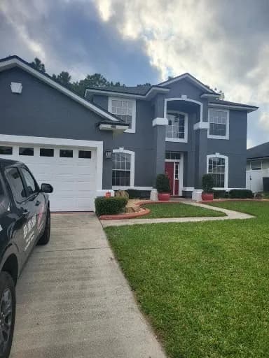 Freshly painted gray home exterior in Jacksonville